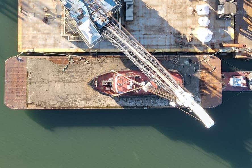 AX9 aerial view alongside derrick barge during marine operation