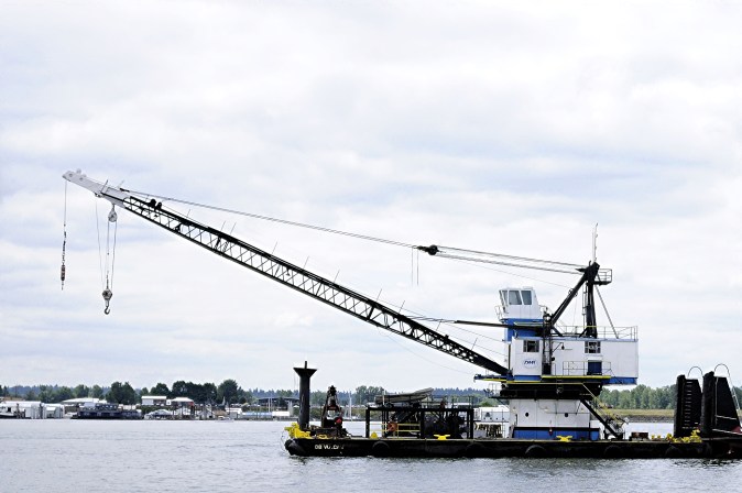 DB VULCAN crane barge with boom raised on the Columbia