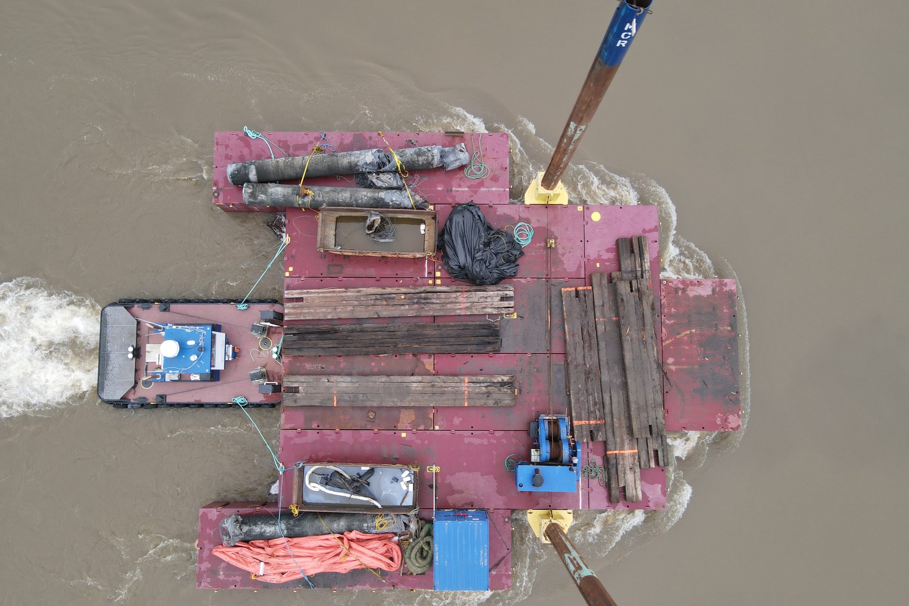 DEMON tug at the dock with crane barge