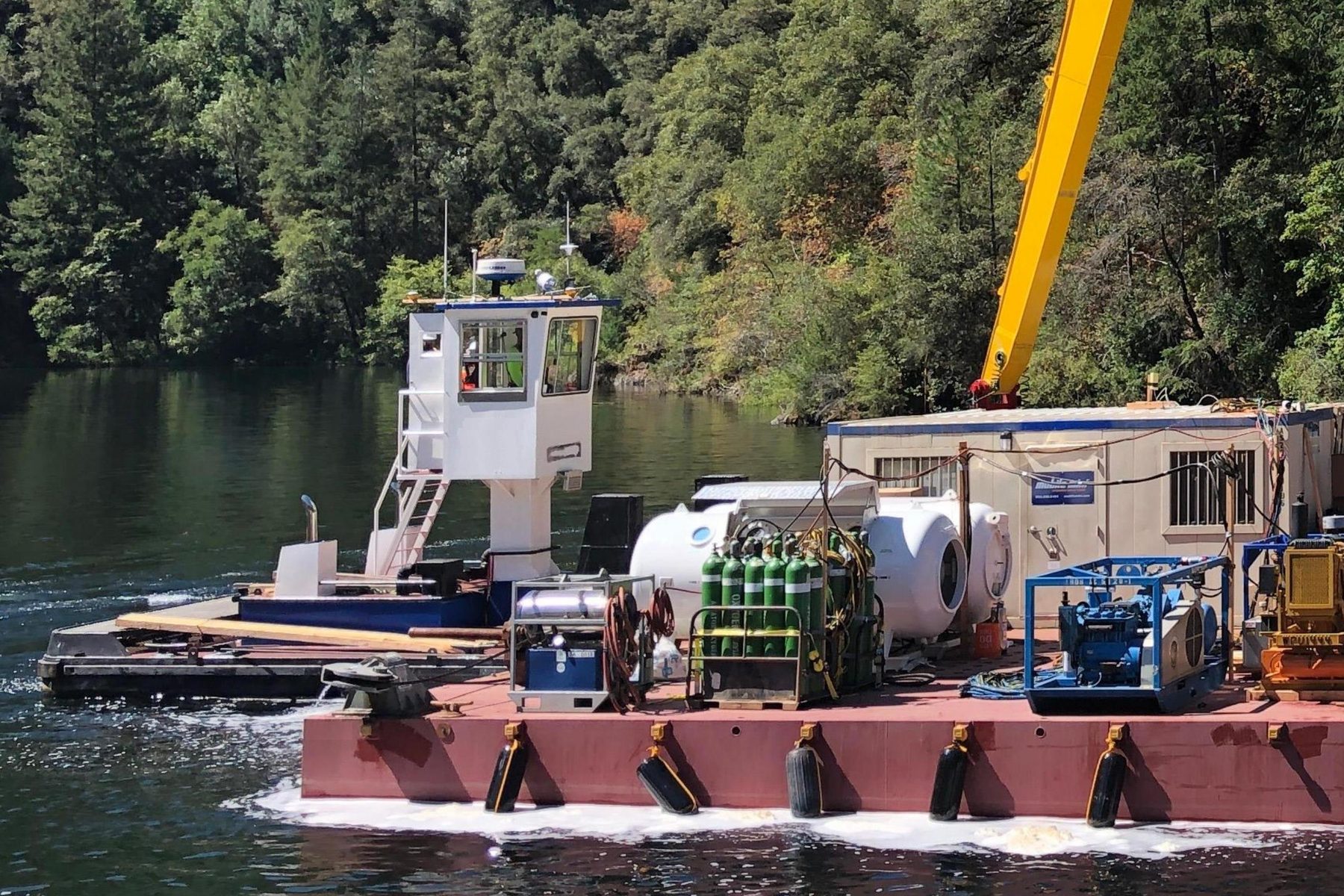DEMON pulling alongside dredge equipment