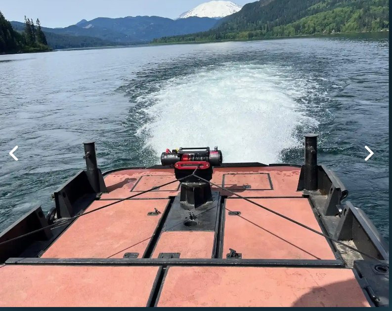 THE GENERAL underway with mountain backdrop