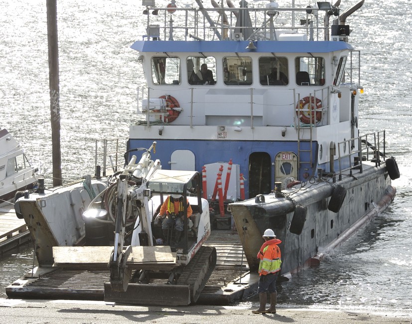 SANDWICK loading a skid-steer through the bow ramp